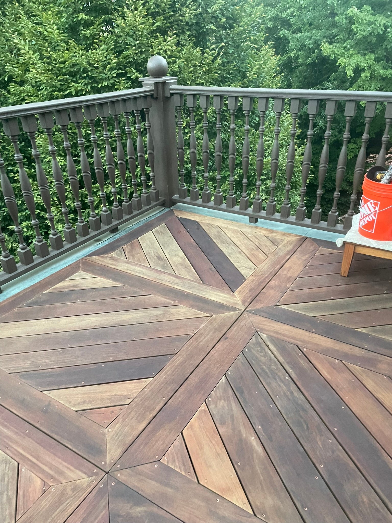 Restored Ipe deck with diagonal X pattern decking and ornate railing in Vernon Hills IL